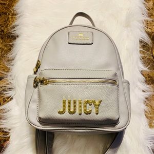 This is a Juicy Couture Bag it is a mini book bag